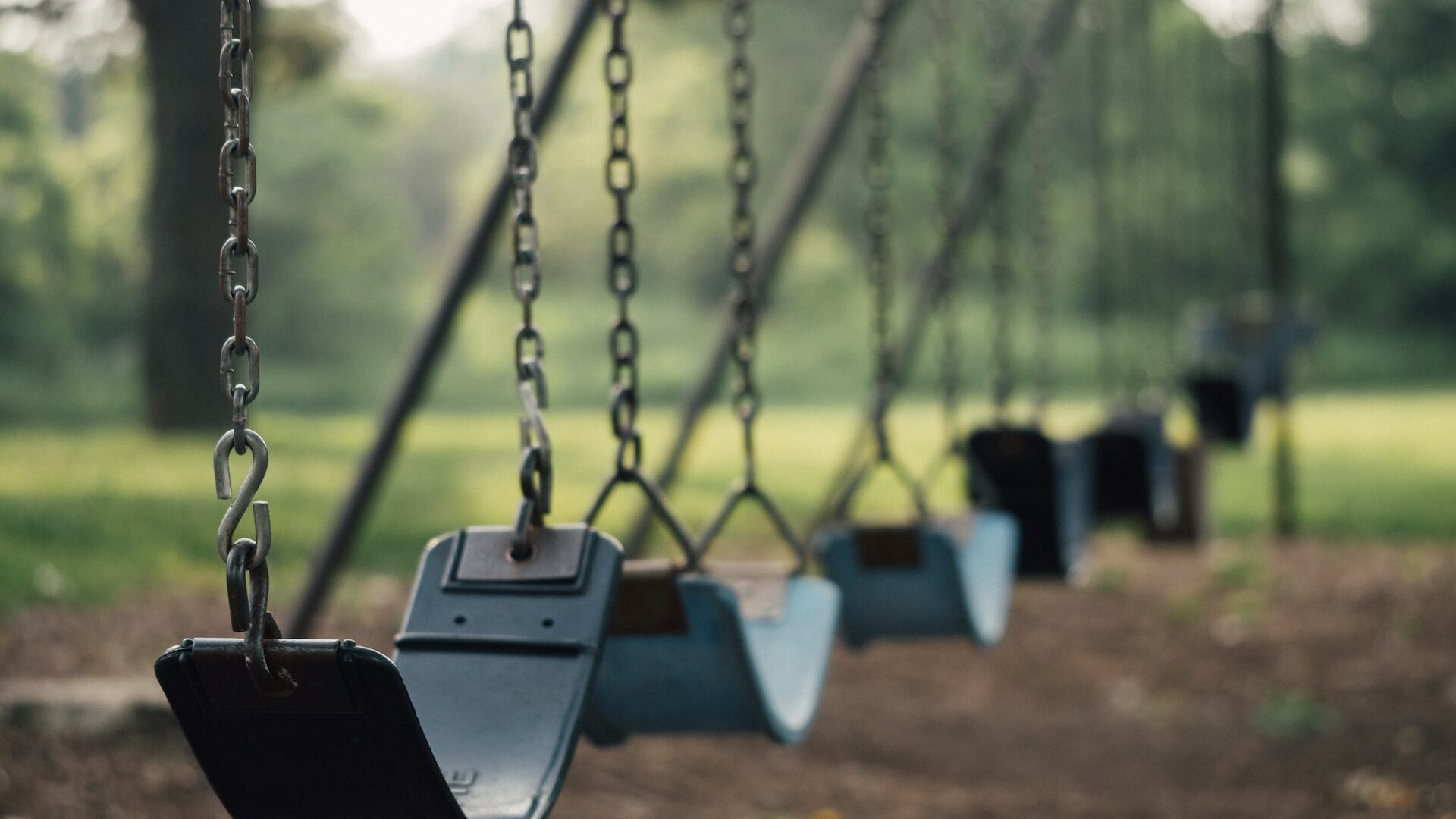 selective focus shot of outdoor swing