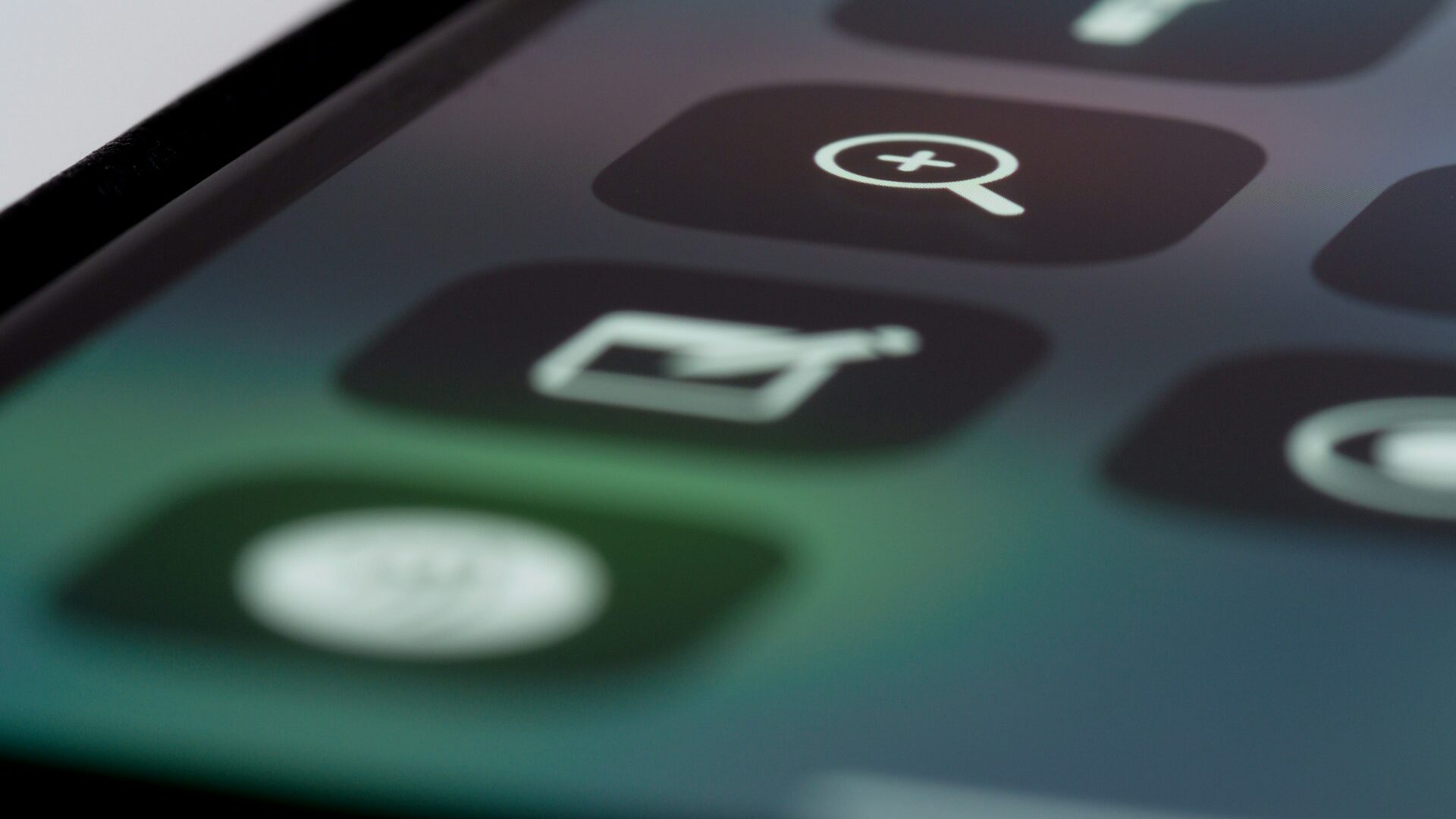 green and black smartphone screen